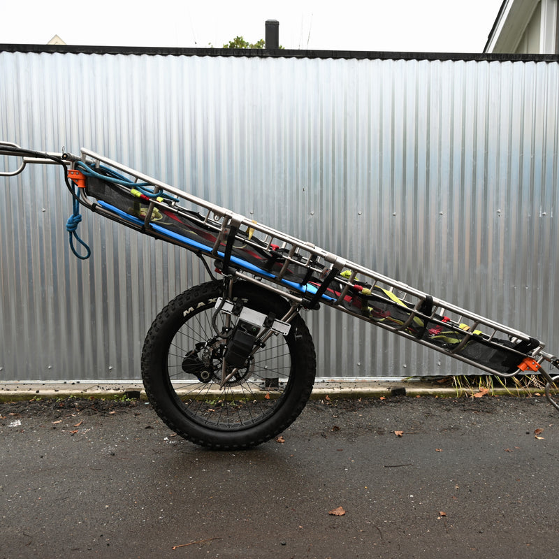 Elevate motor used on a search and rescue litter SAR stokes